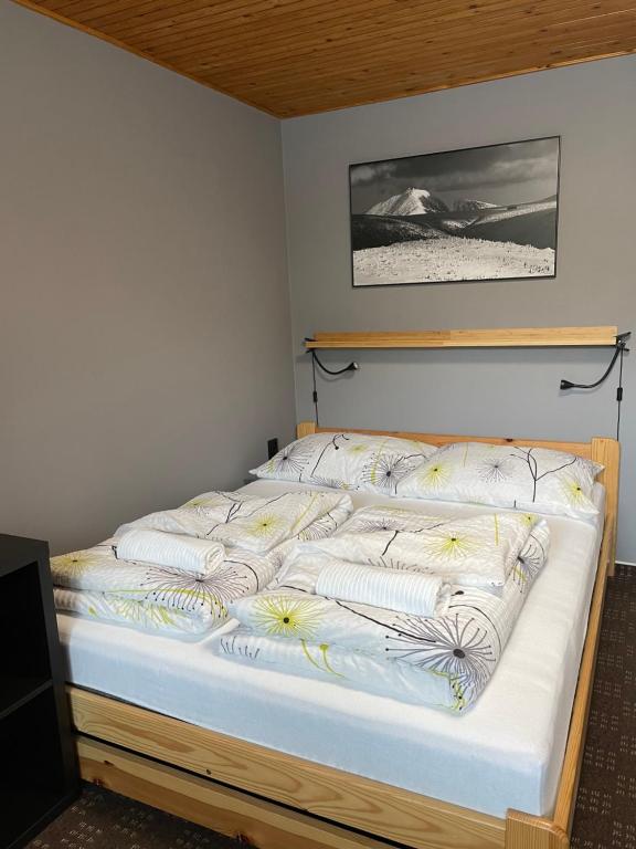 Postel nebo postele na pokoji v ubytování Apartments Maxi
