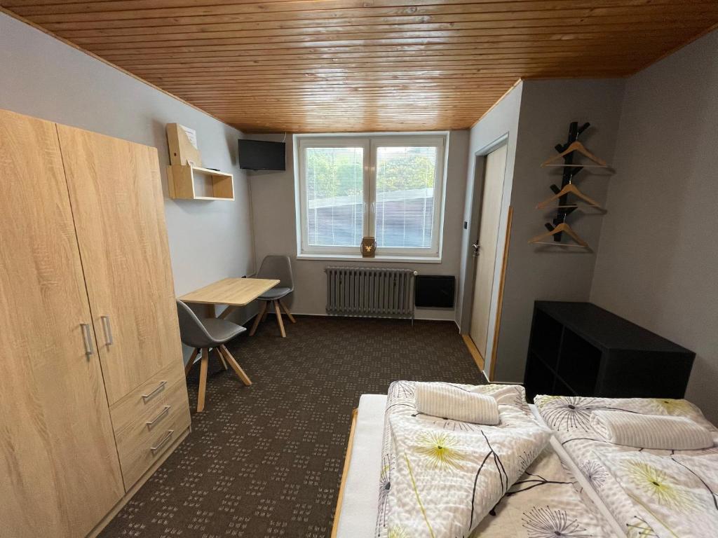 Postel nebo postele na pokoji v ubytování Apartments Maxi