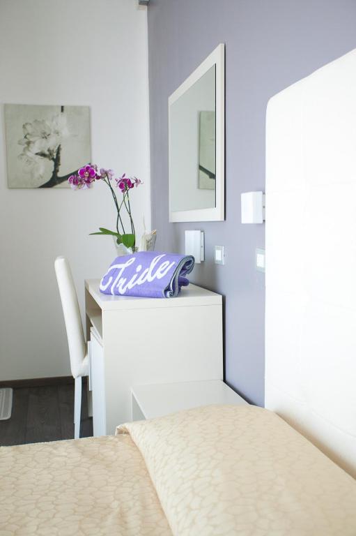 Postel nebo postele na pokoji v ubytování Hotel Iride & Spa