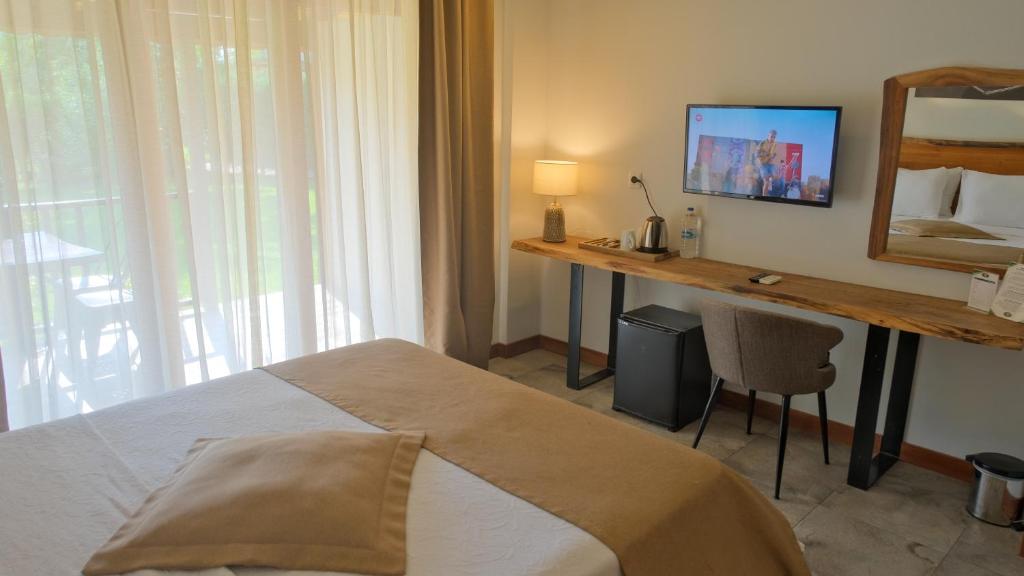 Postel nebo postele na pokoji v ubytování Cevizdibi Hotel