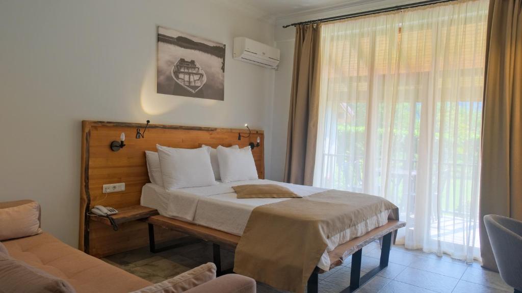 Postel nebo postele na pokoji v ubytování Cevizdibi Hotel