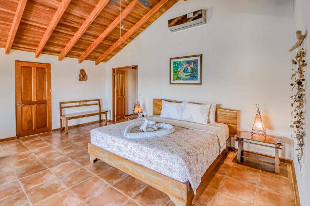 Postel nebo postele na pokoji v ubytování Casa Sueños