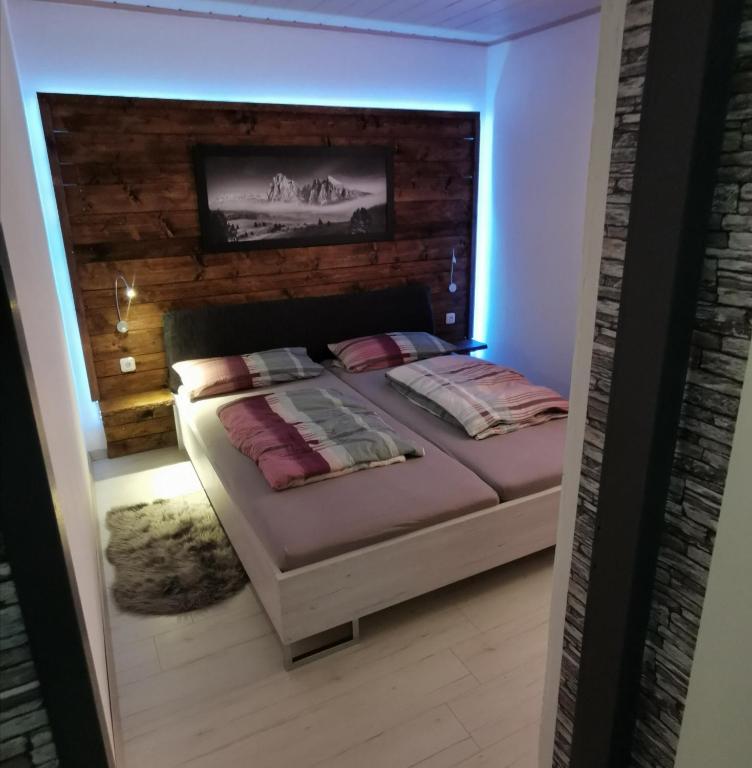 A bed or beds in a room at Ferienwohnung Rotheneder- Rupp
