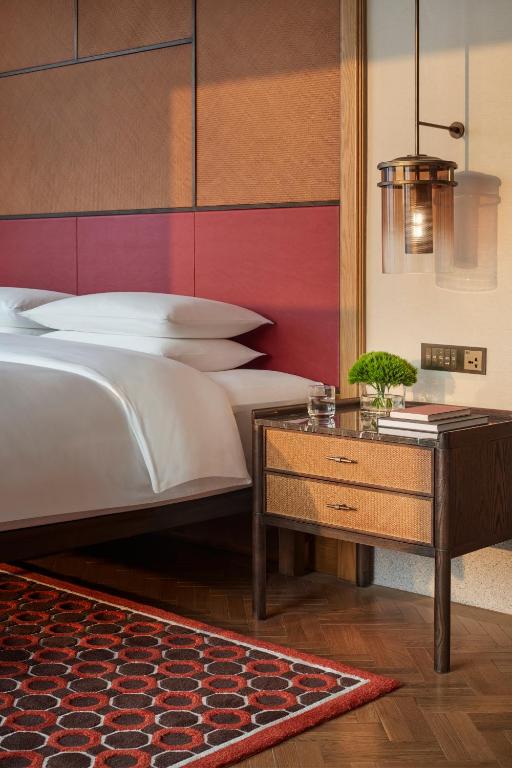 Postel nebo postele na pokoji v ubytování Andaz Xiamen, By Hyatt