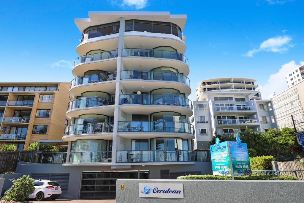 
a large building with a large window on the side of it at Cerulean Apartments in Caloundra
