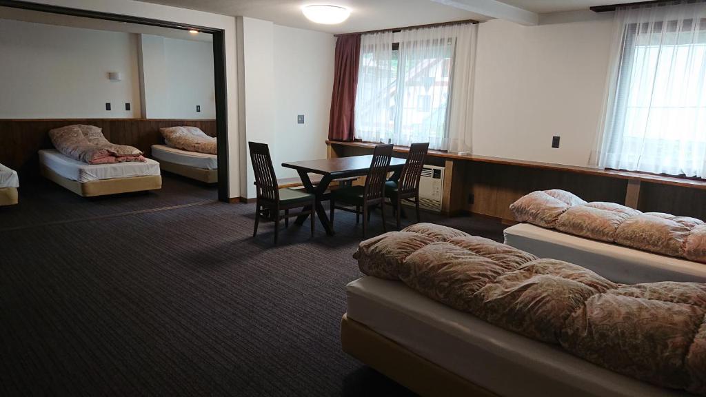 Posezení v ubytování Hotel Weisser Hof Happei