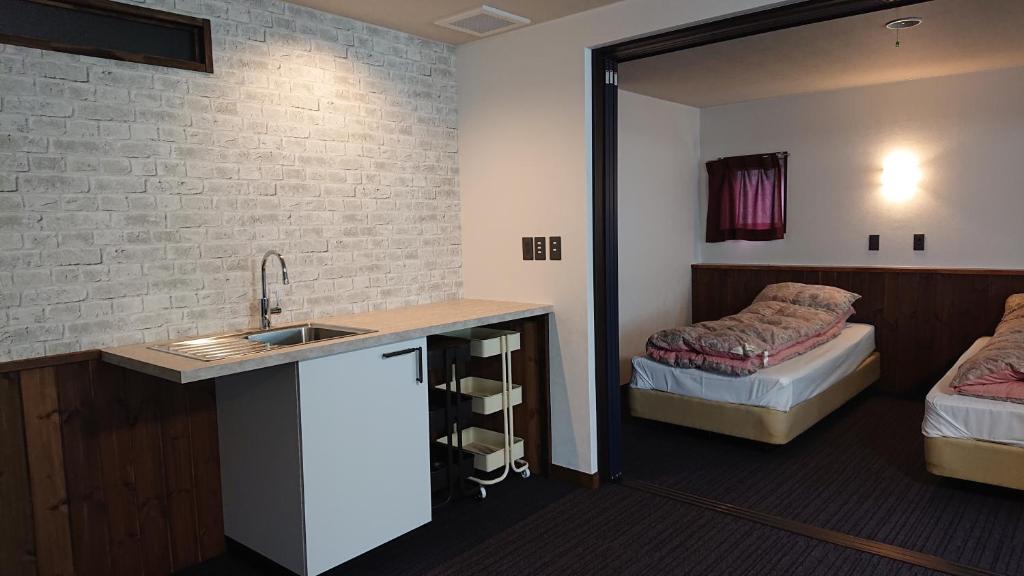 Postel nebo postele na pokoji v ubytování Hotel Weisser Hof Happei