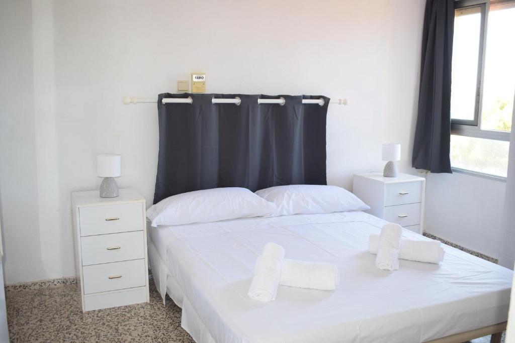 Posteľ alebo postele v izbe v ubytovaní Anacasa Las Viñas Playa Rotas AP2140