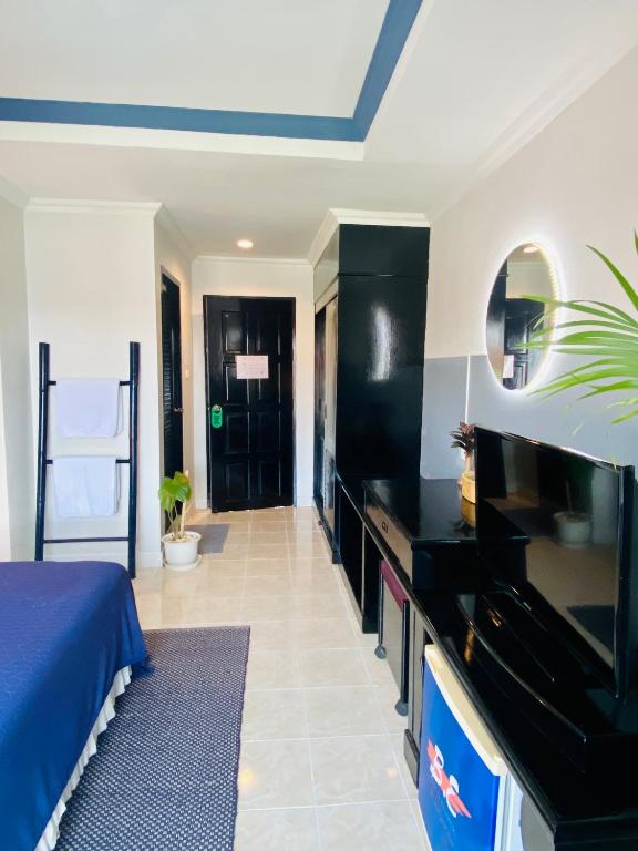 Kuchyň nebo kuchyňský kout v ubytování BH Baan Paradise Hotel Patong