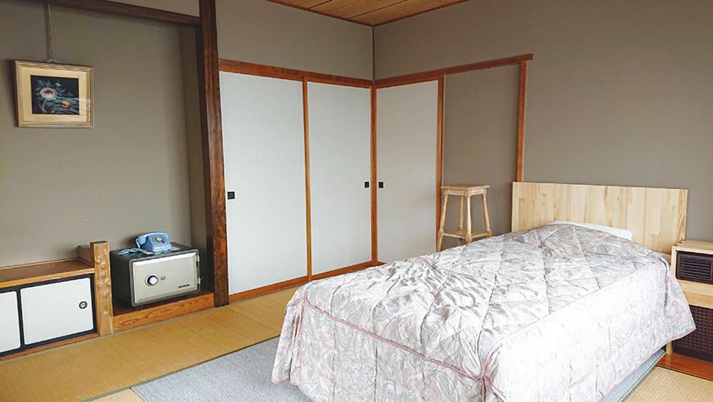 Postel nebo postele na pokoji v ubytování Hotel Weisser Hof Happei