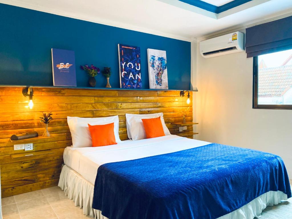 Postel nebo postele na pokoji v ubytování BH Baan Paradise Hotel Patong