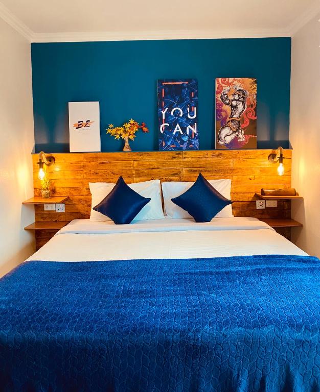 Postel nebo postele na pokoji v ubytování BH Baan Paradise Hotel Patong