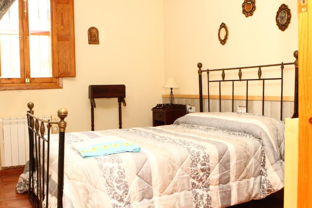 Postel nebo postele na pokoji v ubytování Rural puebla de san miguel