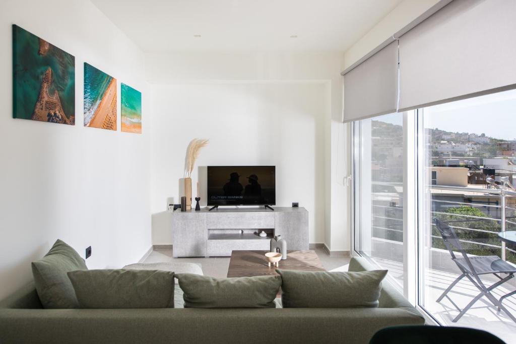 A television and/or entertainment centre at Analogy chania apartment