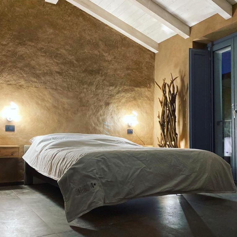 Postel nebo postele na pokoji v ubytování LUVIA ROOMS SPA