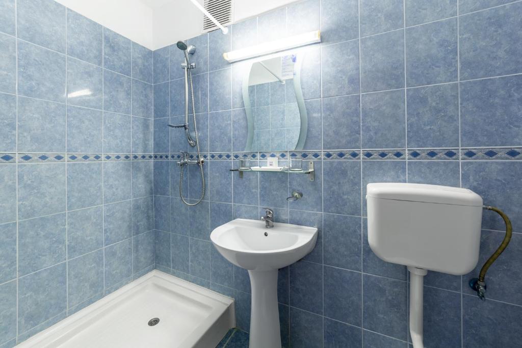 Koupelna v ubytování Hotel Siret Saturn