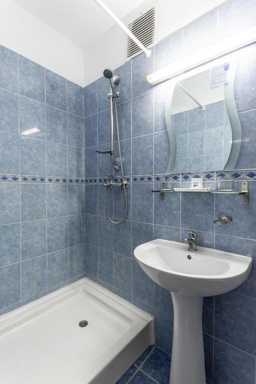 Koupelna v ubytování Hotel Siret Saturn
