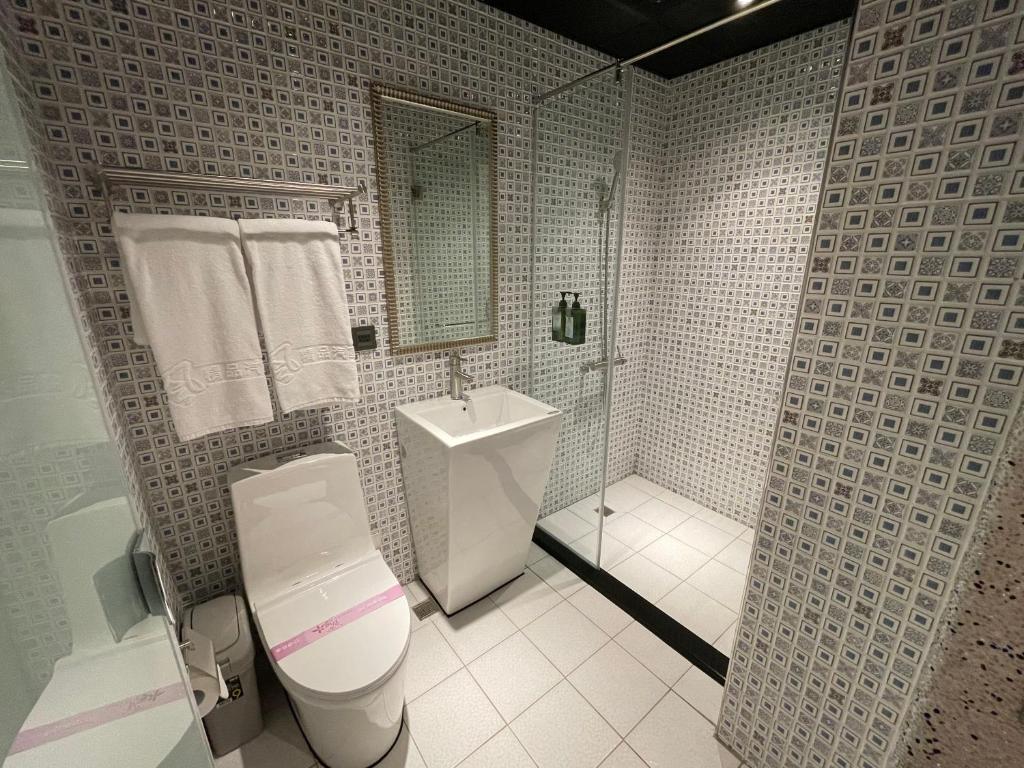 Un baño de Weifeng Boutique Business Hotel - Zhanqian Branch