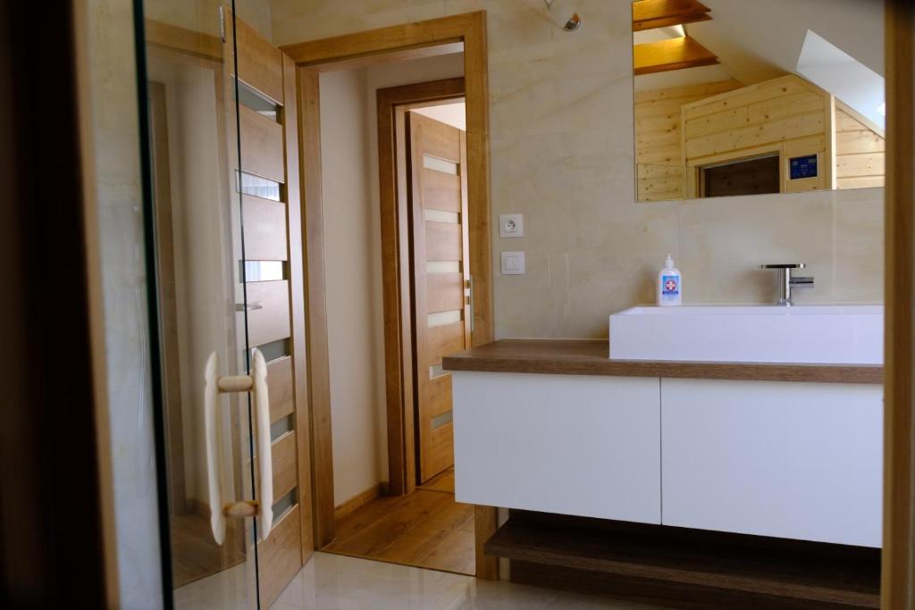 Kuchyň nebo kuchyňský kout v ubytování Apartmány Valča