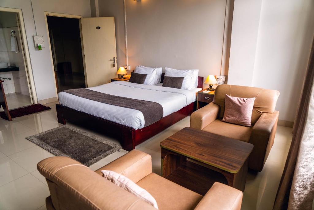 Postel nebo postele na pokoji v ubytování Hotel Ariel