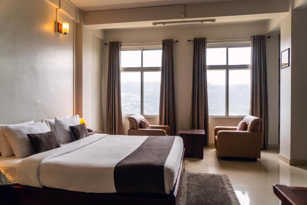 Postel nebo postele na pokoji v ubytování Hotel Ariel