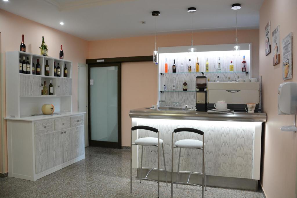 Nápoje v ubytování Hotel Dei Pini