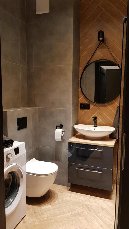 Kúpeľňa v ubytovaní Apartament Zamkowy
