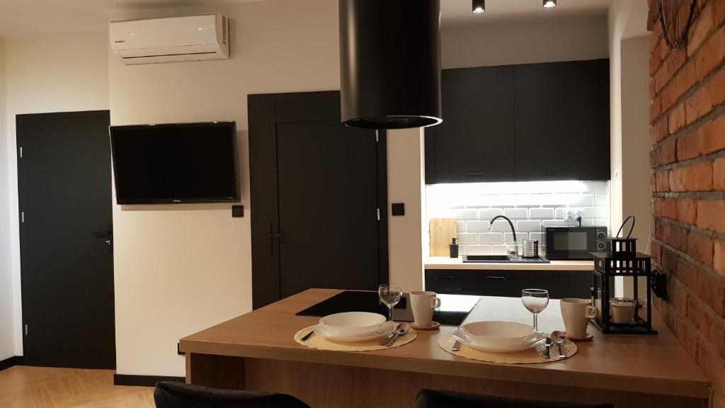 Kuchyňa alebo kuchynka v ubytovaní Apartament Zamkowy