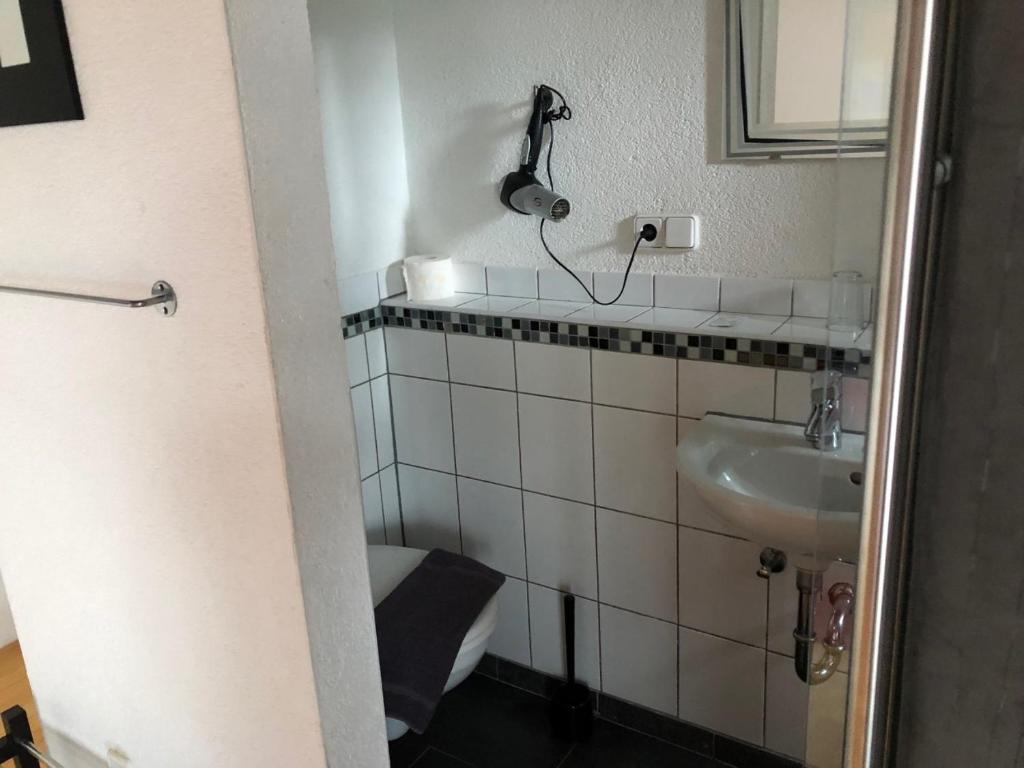 Koupelna v ubytování Hotel Saarland Lebach