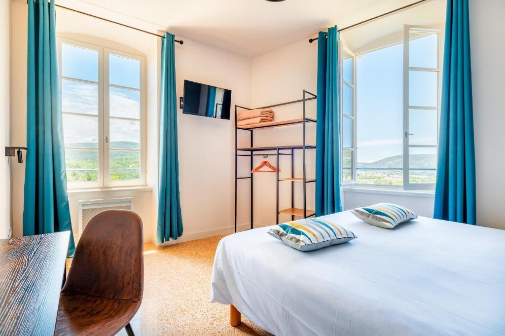 Postel nebo postele na pokoji v ubytování Le Nesk Ventoux - Hotel