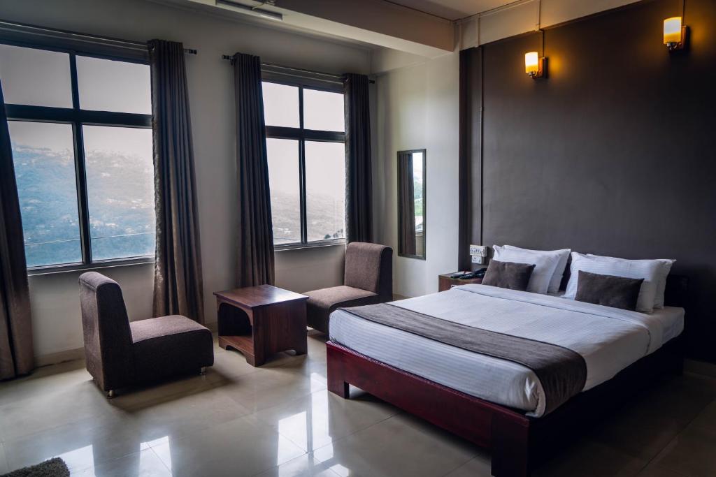 Postel nebo postele na pokoji v ubytování Hotel Ariel