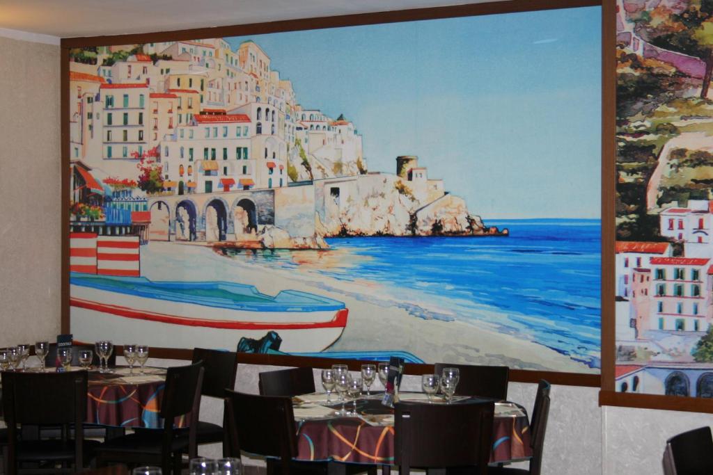 Restaurant o un lloc per menjar a Hôtel Vesuvio