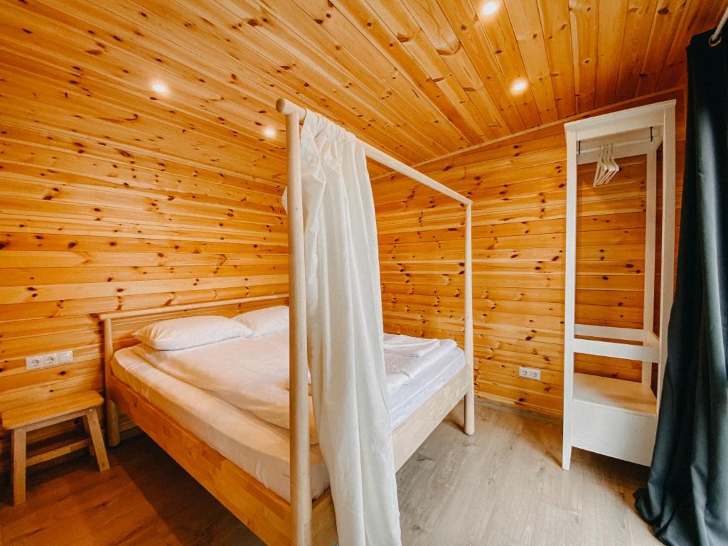Postel nebo postele na pokoji v ubytování Pixel - Tiny Campus