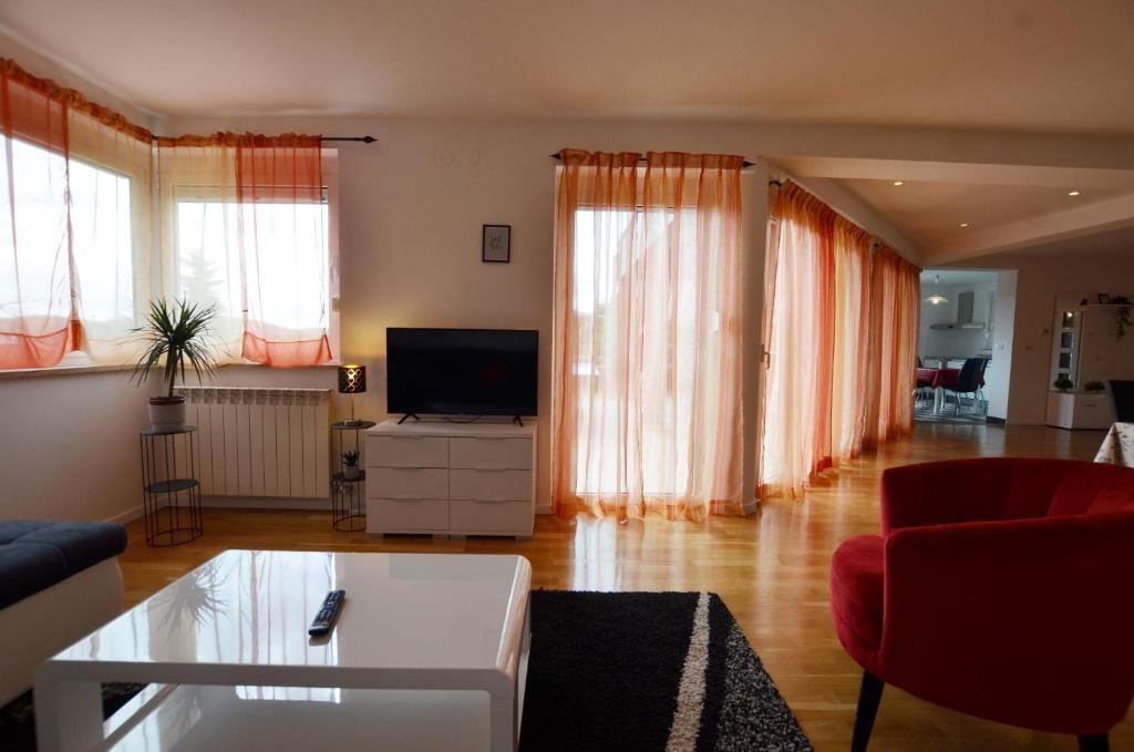 Telewizja i/lub zestaw kina domowego w obiekcie Casa Rubino
