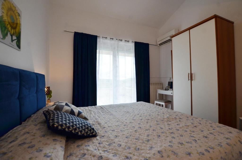 Łóżko lub łóżka w pokoju w obiekcie Casa Rubino