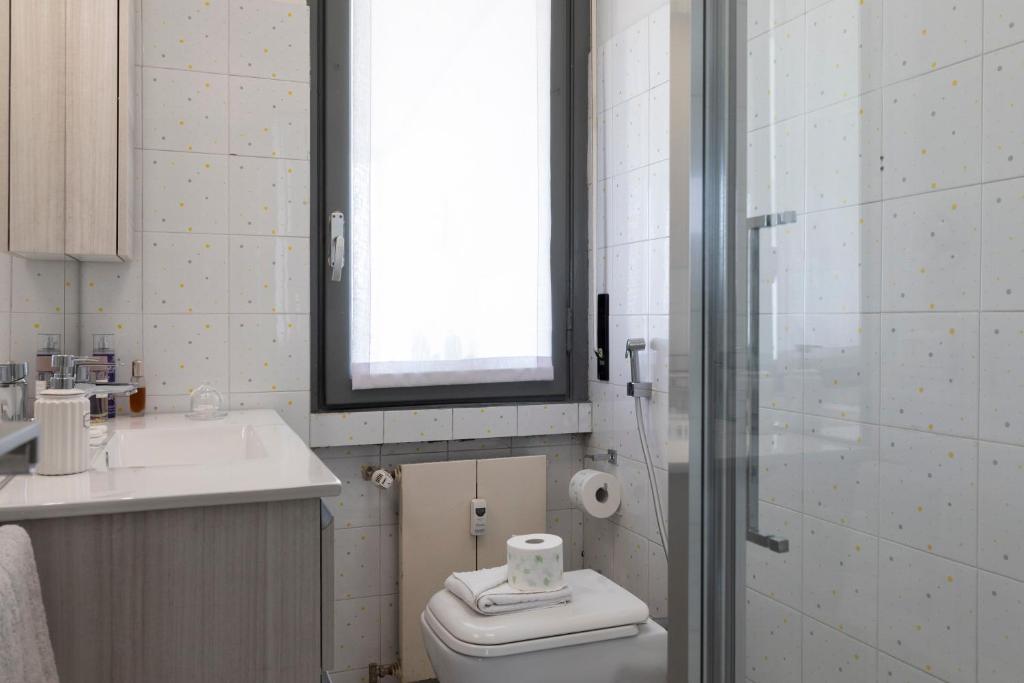 Kúpeľňa v ubytovaní La Veranda - Bright Top Floor apartment with views of the Madonnina