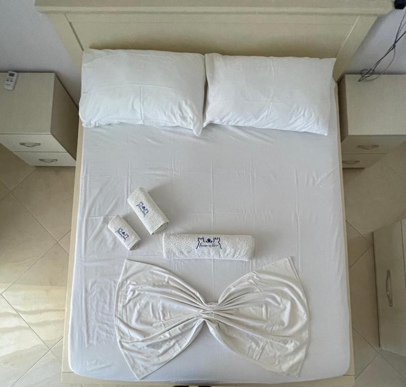 Postel nebo postele na pokoji v ubytování Residence kullat 2