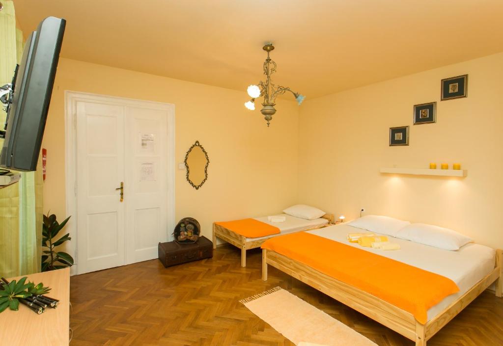 Postel nebo postele na pokoji v ubytování Villa Iveta