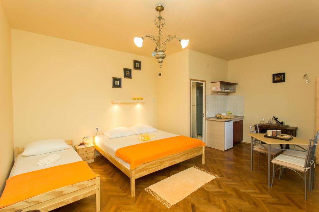 Postel nebo postele na pokoji v ubytování Villa Iveta
