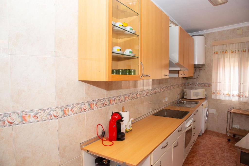 a kitchen with a sink and a counter top at Vivienda turística María de Padilla in Montiel
