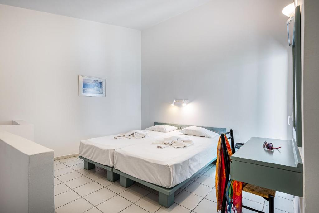 A bed or beds in a room at Aphea Village