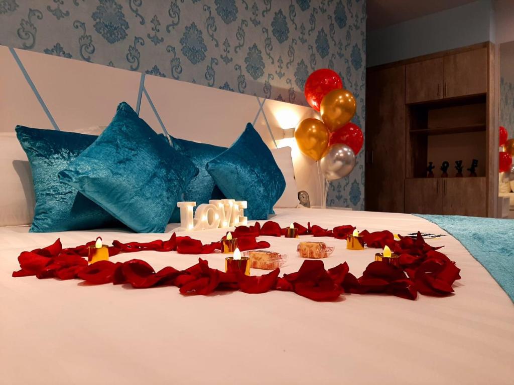 Postel nebo postele na pokoji v ubytování Luma Plaza Hotel