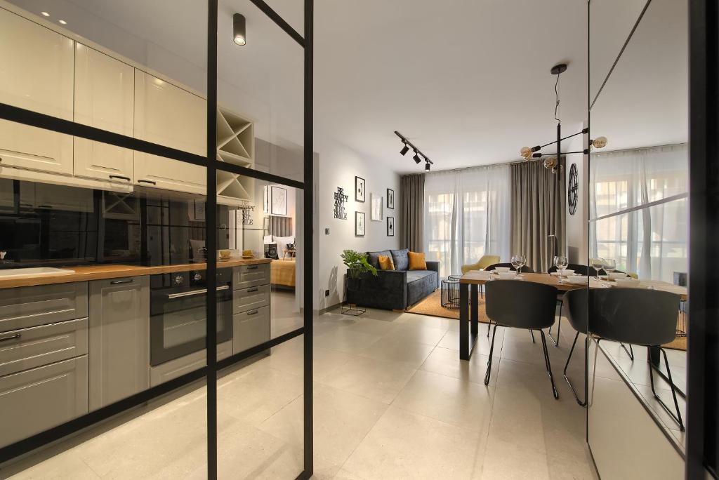 Kuchyň nebo kuchyňský kout v ubytování Elite Apartament Parking by IMPERO