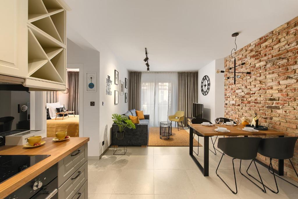 Kuchyň nebo kuchyňský kout v ubytování Elite Apartament Parking by IMPERO