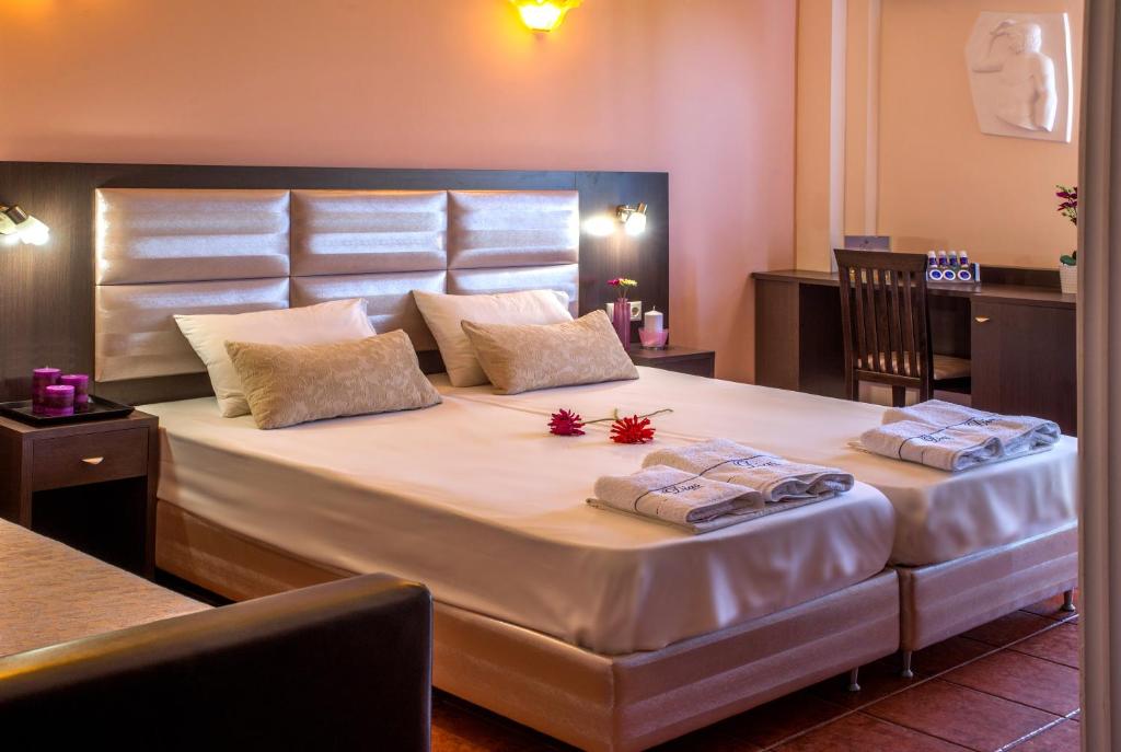 Postel nebo postele na pokoji v ubytování Hotel Dias
