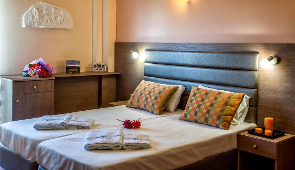 Postel nebo postele na pokoji v ubytování Hotel Dias