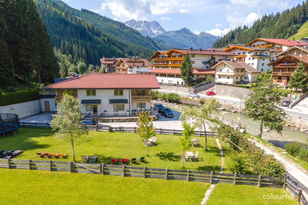 an aerial view of a village in the mountains at Appartments Am Bach in Gerlos