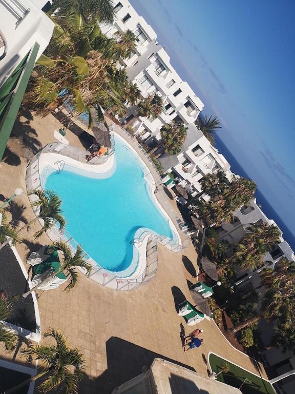 an aerial view of a resort with a swimming pool at El Sueño Ocean Lanzamar - Puerto Del Carmen in Puerto del Carmen