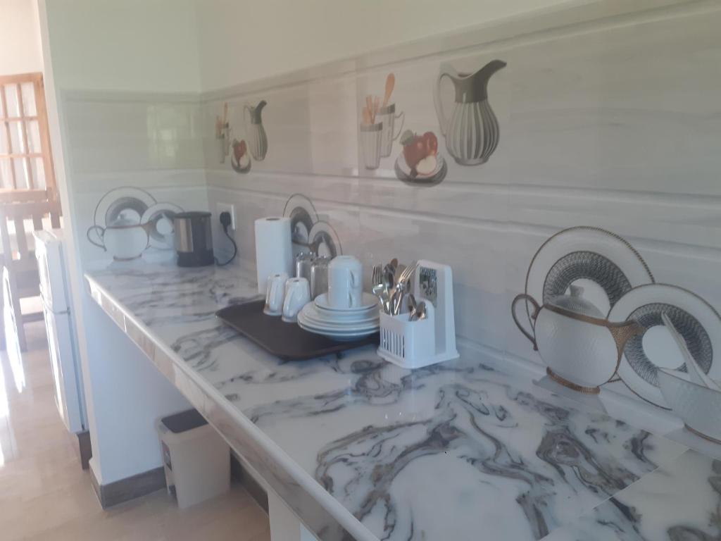 Kuchyň nebo kuchyňský kout v ubytování La Residence D'Almee Guesthouse