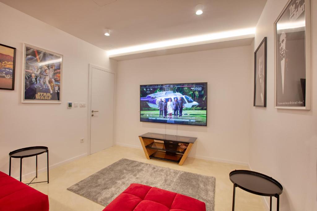TV a/nebo společenská místnost v ubytování Villa Spuga